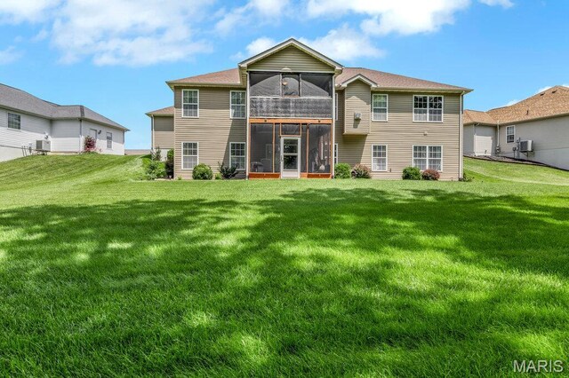 1020 Oak Creek Ln, Waterloo, IL 62298 - back of house featuring a sunroom and a yard