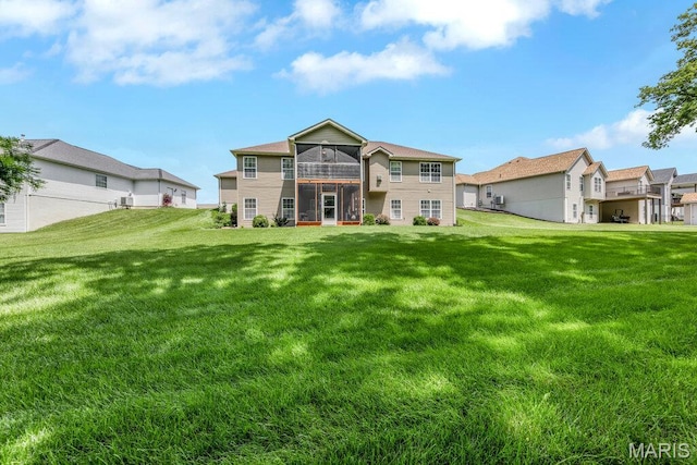 1020 Oak Creek Ln, Waterloo, IL 62298 - rear view of house with a sunroom and a yard