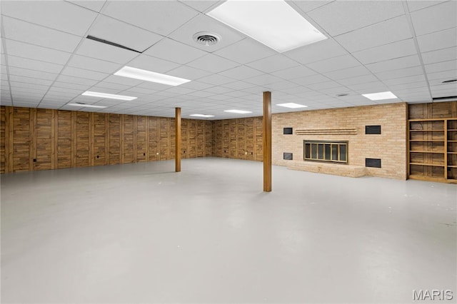 305 Ridge Dr, Sikeston, MO 63801 - below grade area with a paneled ceiling