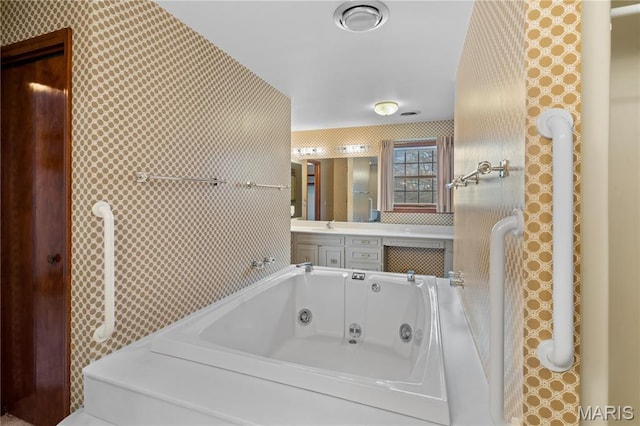 305 Ridge Dr, Sikeston, MO 63801 - full bath with wallpapered walls, a tub with jets, and vanity