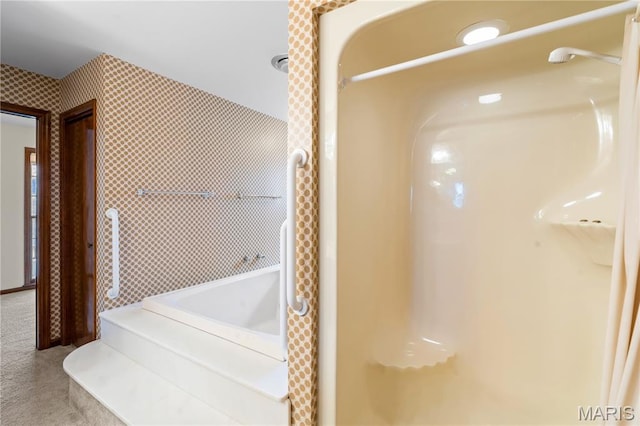 305 Ridge Dr, Sikeston, MO 63801 - bathroom featuring a tub to relax in and a shower