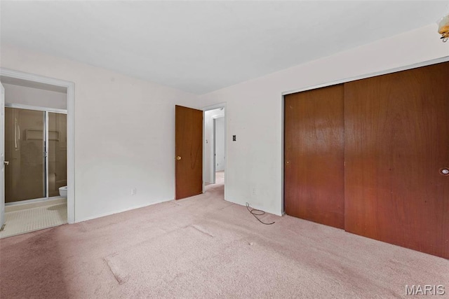1466 Friar Tuck Ln, Lemay Township, MO 63125 - unfurnished bedroom with carpet flooring, a closet, and connected bathroom