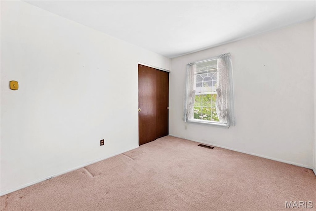 1466 Friar Tuck Ln, Lemay Township, MO 63125 - empty room with light colored carpet and baseboards