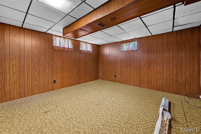 1466 Friar Tuck Ln, Lemay Township, MO 63125 - basement featuring carpet flooring, a paneled ceiling, and wooden walls