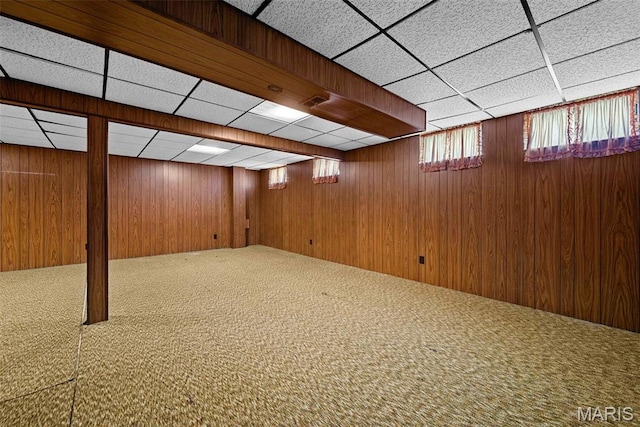 1466 Friar Tuck Ln, Lemay Township, MO 63125 - basement featuring carpet floors, wooden walls, and a paneled ceiling