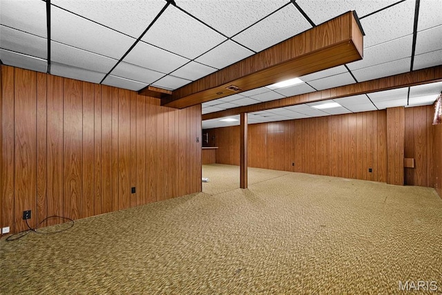 1466 Friar Tuck Ln, Lemay Township, MO 63125 - finished below grade area with carpet flooring, a paneled ceiling, and wooden walls