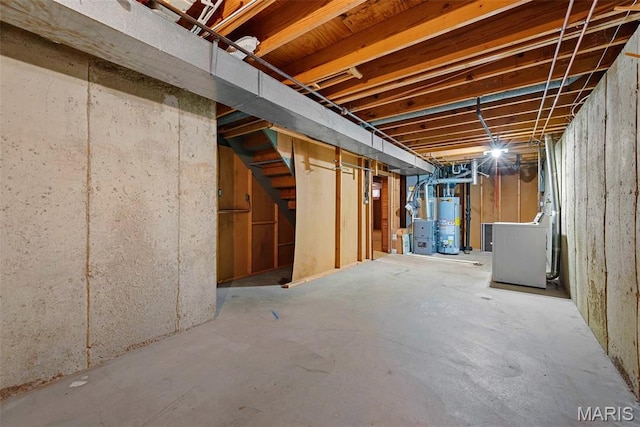 1466 Friar Tuck Ln, Lemay Township, MO 63125 - unfinished basement with water heater and stairs