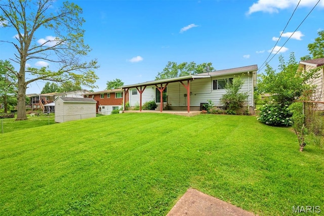 1466 Friar Tuck Ln, Lemay Township, MO 63125 - rear view of property featuring a patio area and a shed