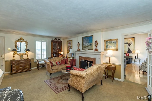 3 Deer Creek Woods, Ladue, MO 63124 - living area featuring crown molding, a fireplace, and carpet flooring