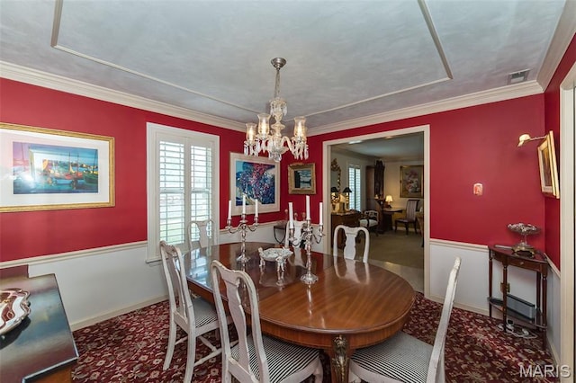 3 Deer Creek Woods, Ladue, MO 63124 - carpeted dining space with a chandelier and crown molding