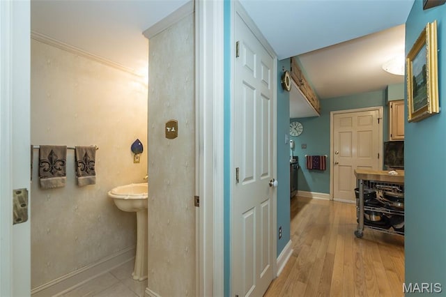 3 Deer Creek Woods, Ladue, MO 63124 - bathroom featuring wood finished floors and baseboards