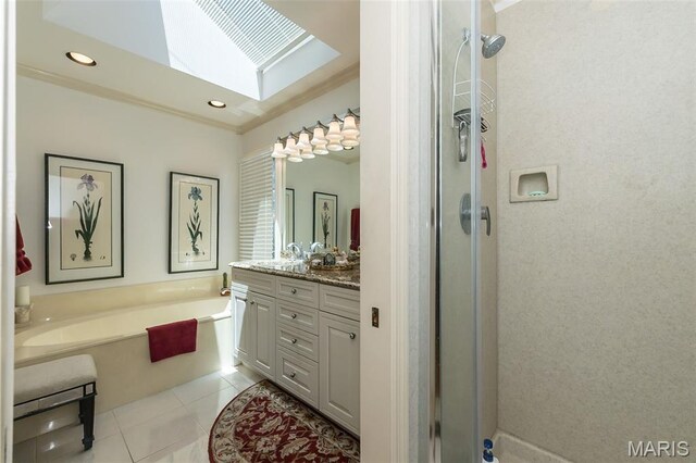 3 Deer Creek Woods, Ladue, MO 63124 - full bathroom with vanity, a skylight, a bath, tile patterned flooring, and a shower stall