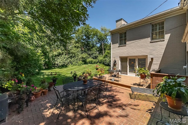 3 Deer Creek Woods, Ladue, MO 63124 - view of patio / terrace with outdoor dining space and a deck
