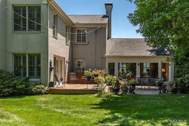 3 Deer Creek Woods, Ladue, MO 63124 - rear view of property with a deck, a chimney, and a lawn