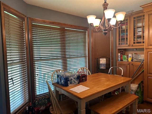 11355 Satmoore Rd, Dexter, MO 63841 - dining room featuring a chandelier