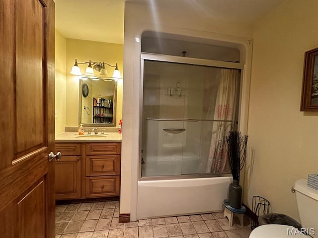 11355 Satmoore Rd, Dexter, MO 63841 - full bathroom with vanity, toilet, and shower / bath combination with glass door