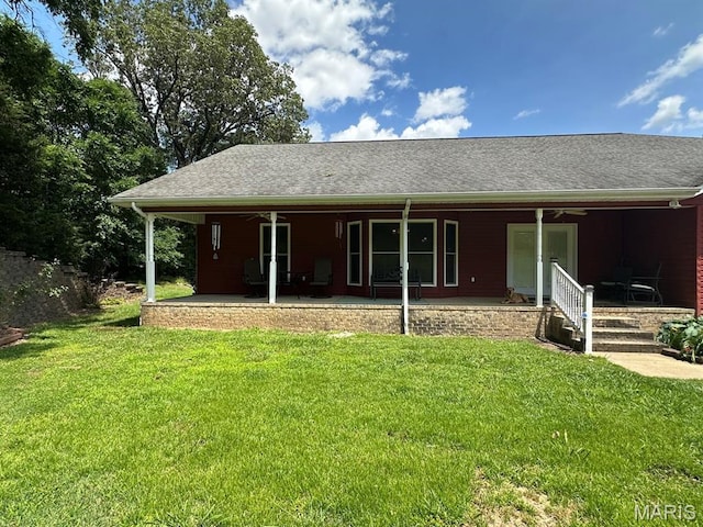 11355 Satmoore Rd, Dexter, MO 63841 - back of house featuring covered porch, a lawn, and ceiling fan