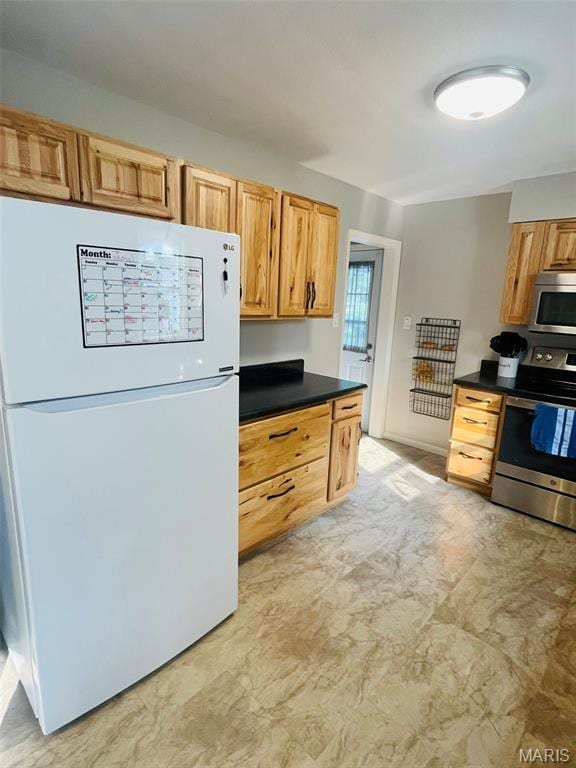 111 Elm St, Cottage Hills, IL 62018 - kitchen with stainless steel appliances and dark countertops