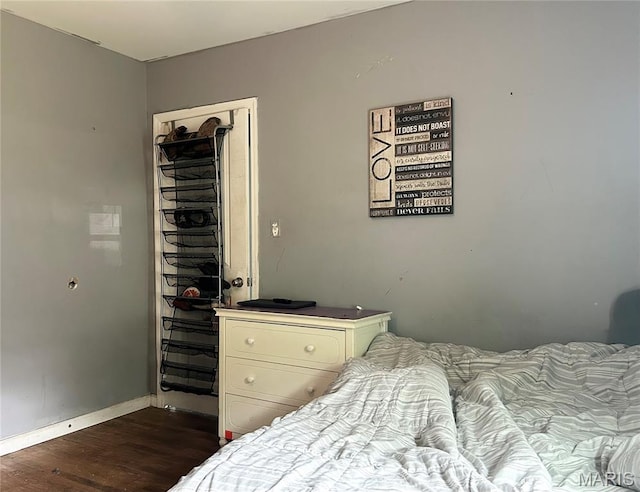 450 N Main St, Saint Clair, MO 63077 - bedroom with dark wood finished floors and baseboards