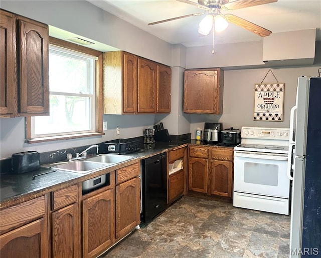 450 N Main St, Saint Clair, MO 63077 - kitchen with white appliances, a sink, brown cabinets, stone finish flooring, and dark countertops