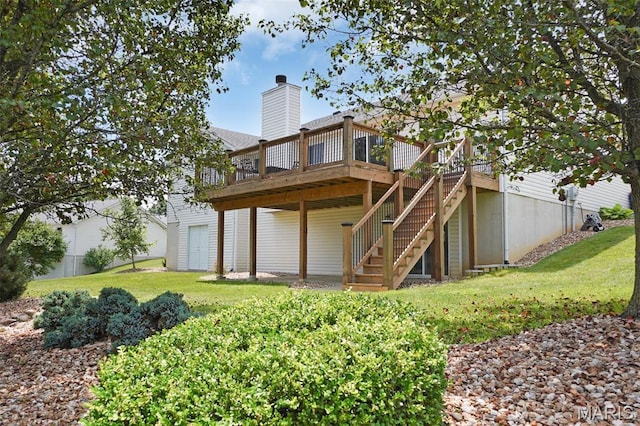 3837 Bedford Pointe Dr, Wentzville, MO 63385 - back of property with stairs, a lawn, a deck, and a chimney