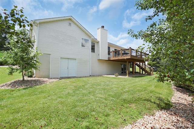 3837 Bedford Pointe Dr, Wentzville, MO 63385 - rear view of house featuring stairs, a deck, a lawn, and a chimney