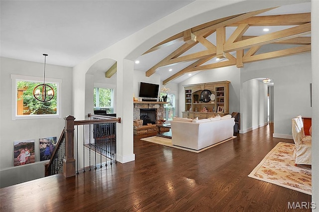 1316 Breezeridge Dr, Des Peres, MO 63131 - living room with recessed lighting, arched walkways, wood finished floors, baseboards, and a chandelier