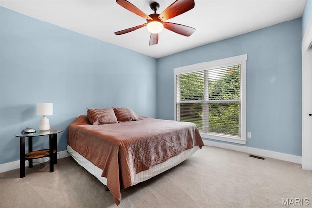 1316 Breezeridge Dr, Des Peres, MO 63131 - bedroom featuring light carpet, baseboards, and ceiling fan
