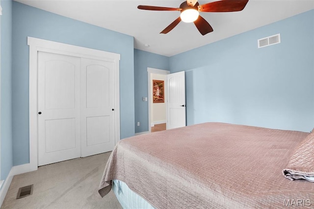 1316 Breezeridge Dr, Des Peres, MO 63131 - bedroom with light carpet, a closet, baseboards, and a ceiling fan