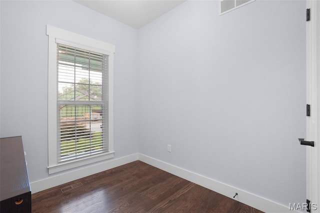 1316 Breezeridge Dr, Des Peres, MO 63131 - unfurnished room featuring baseboards and dark wood-style flooring