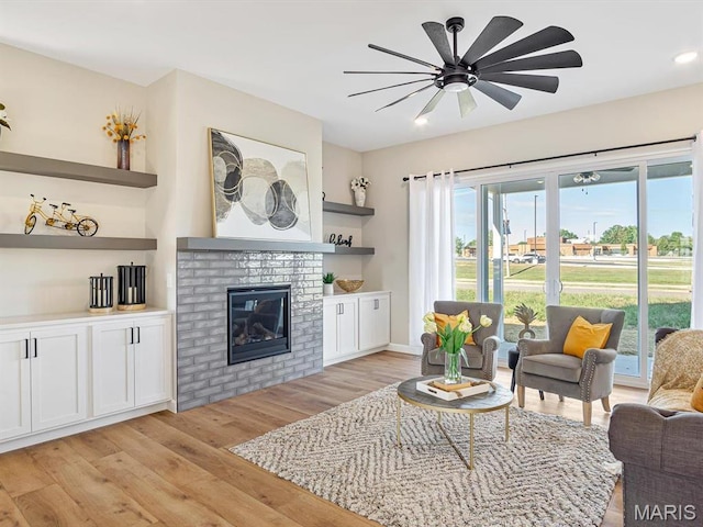 484 Hayden Dr, Waterloo, IL 62298 - living area with light wood-style flooring, a ceiling fan, a fireplace, and recessed lighting
