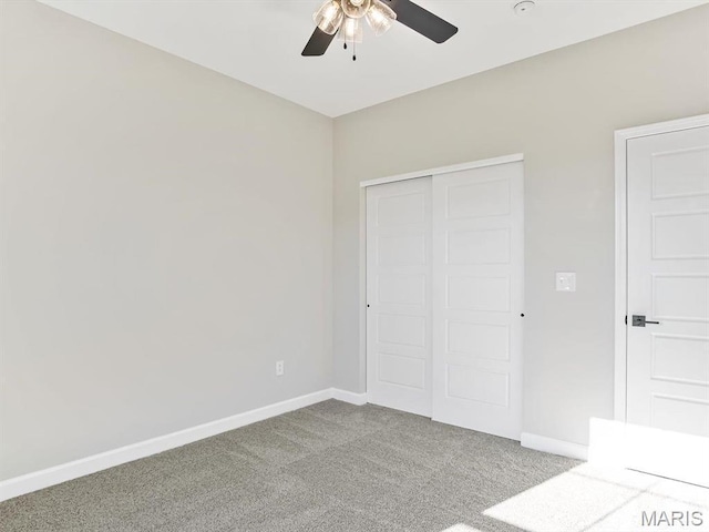 484 Hayden Dr, Waterloo, IL 62298 - unfurnished bedroom featuring carpet floors, a closet, baseboards, and ceiling fan