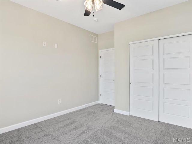 484 Hayden Dr, Waterloo, IL 62298 - unfurnished bedroom with carpet floors, baseboards, a closet, and ceiling fan