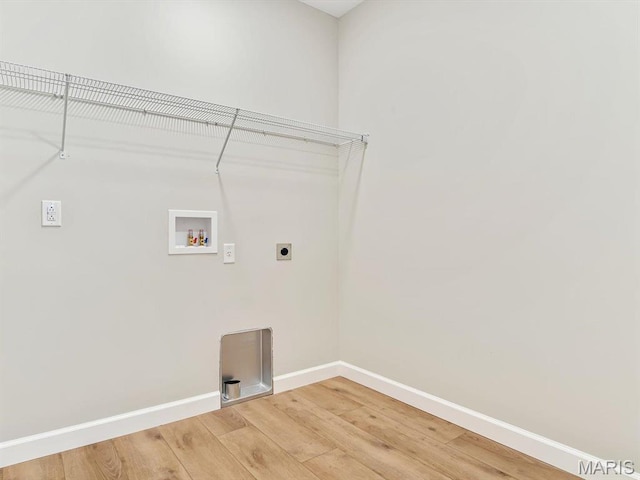 484 Hayden Dr, Waterloo, IL 62298 - washroom featuring light wood-style floors, baseboards, hookup for an electric dryer, and washer hookup