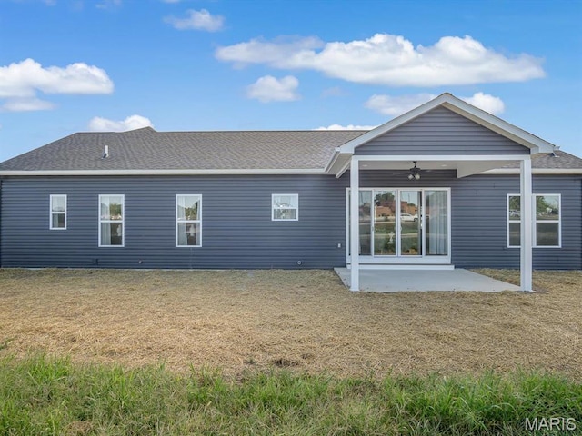 484 Hayden Dr, Waterloo, IL 62298 - rear view of house featuring a ceiling fan, a patio area, a lawn, and roof with shingles