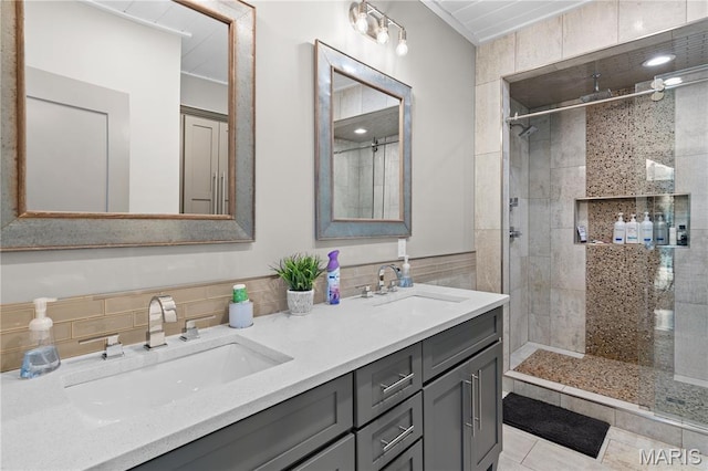 2262 Brown Rd, Van Buren, MO 63965 - bathroom with tiled shower, double vanity, tile walls, and tile patterned flooring
