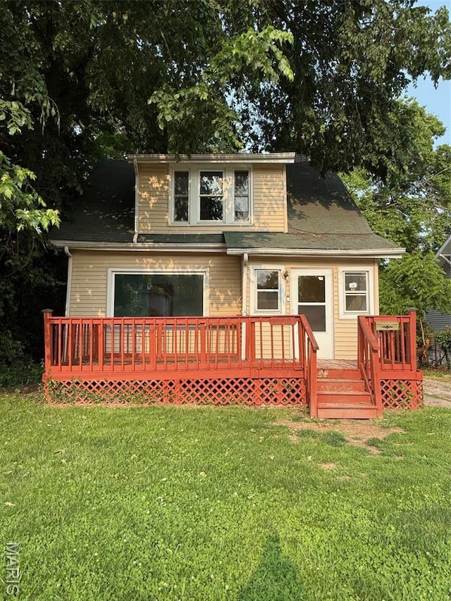 2213 Johnson St, Alton, IL 62002 - back of house featuring a deck and a lawn