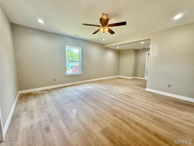 500 W Pacific St, Pacific, MO 63069 - empty room featuring a ceiling fan, light wood-type flooring, and recessed lighting