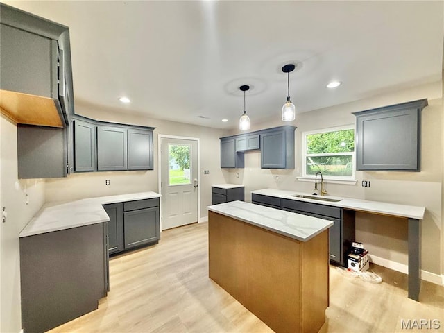 500 W Pacific St, Pacific, MO 63069 - kitchen with healthy amount of natural light, light wood-style flooring, pendant lighting, and recessed lighting