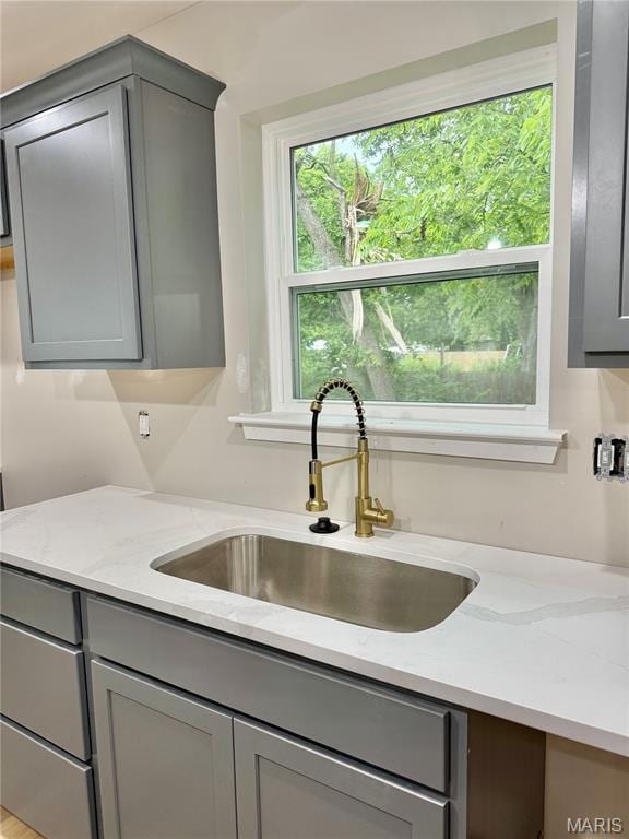 500 W Pacific St, Pacific, MO 63069 - kitchen with gray cabinets and light stone countertops