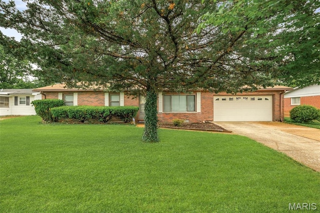 20 Lakeland Blvd, Swansea, IL 62226 - view of front of house featuring concrete driveway, brick siding, a garage, and a front lawn