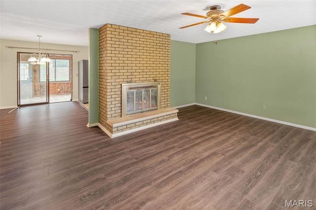 20 Lakeland Blvd, Swansea, IL 62226 - unfurnished living room with a chandelier, baseboards, ceiling fan, dark wood-style flooring, and a fireplace