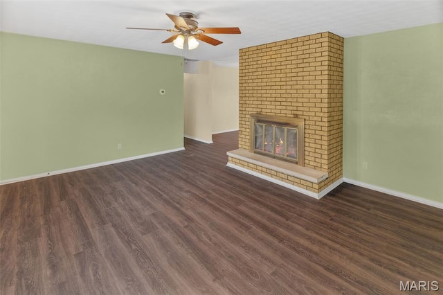 20 Lakeland Blvd, Swansea, IL 62226 - unfurnished living room with ceiling fan, wood finished floors, a brick fireplace, and baseboards