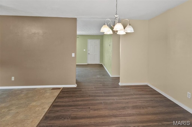 20 Lakeland Blvd, Swansea, IL 62226 - unfurnished dining area featuring a chandelier, baseboards, and dark wood-style floors