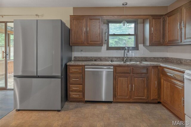 20 Lakeland Blvd, Swansea, IL 62226 - kitchen with appliances with stainless steel finishes, a sink, and decorative backsplash