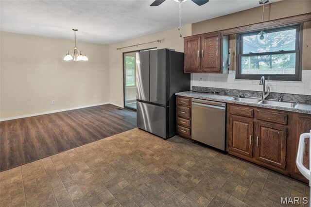 20 Lakeland Blvd, Swansea, IL 62226 - kitchen featuring appliances with stainless steel finishes, a sink, ceiling fan, and plenty of natural light