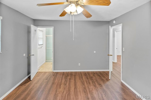 20 Lakeland Blvd, Swansea, IL 62226 - empty room featuring wood finished floors, baseboards, and a ceiling fan