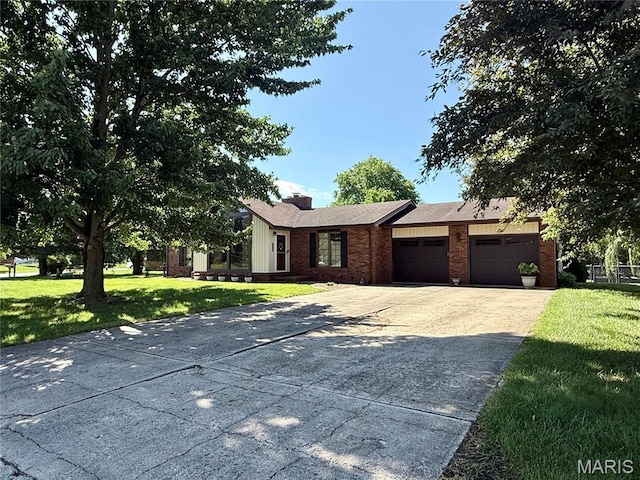 112 Cross Creek Dr, Bethalto, IL 62010 - ranch-style home featuring an attached garage, concrete driveway, brick siding, and a front yard