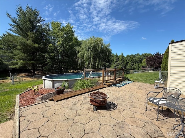 112 Cross Creek Dr, Bethalto, IL 62010 - view of patio / terrace with a fire pit and an outdoor pool