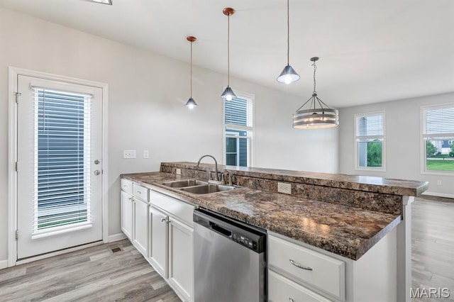 109 Starry Night Way, Saint Charles, MO 63301 - kitchen featuring dishwasher, a peninsula, light wood-style flooring, and white cabinets